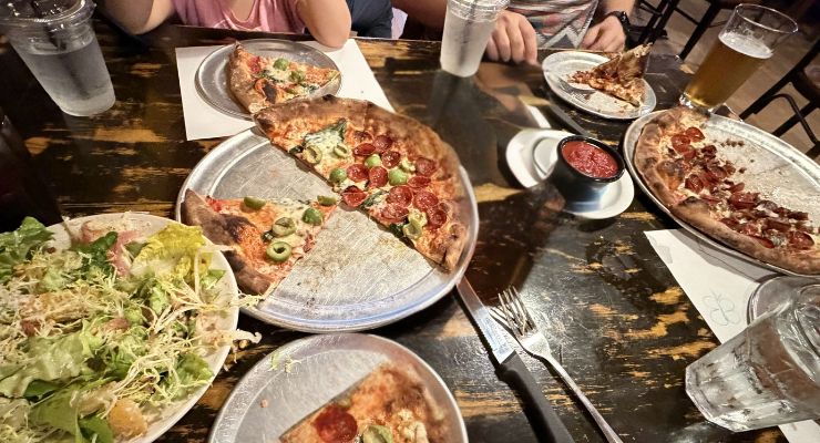 Pizza so good we forgot to take a picture first, at EVO Pizzeria