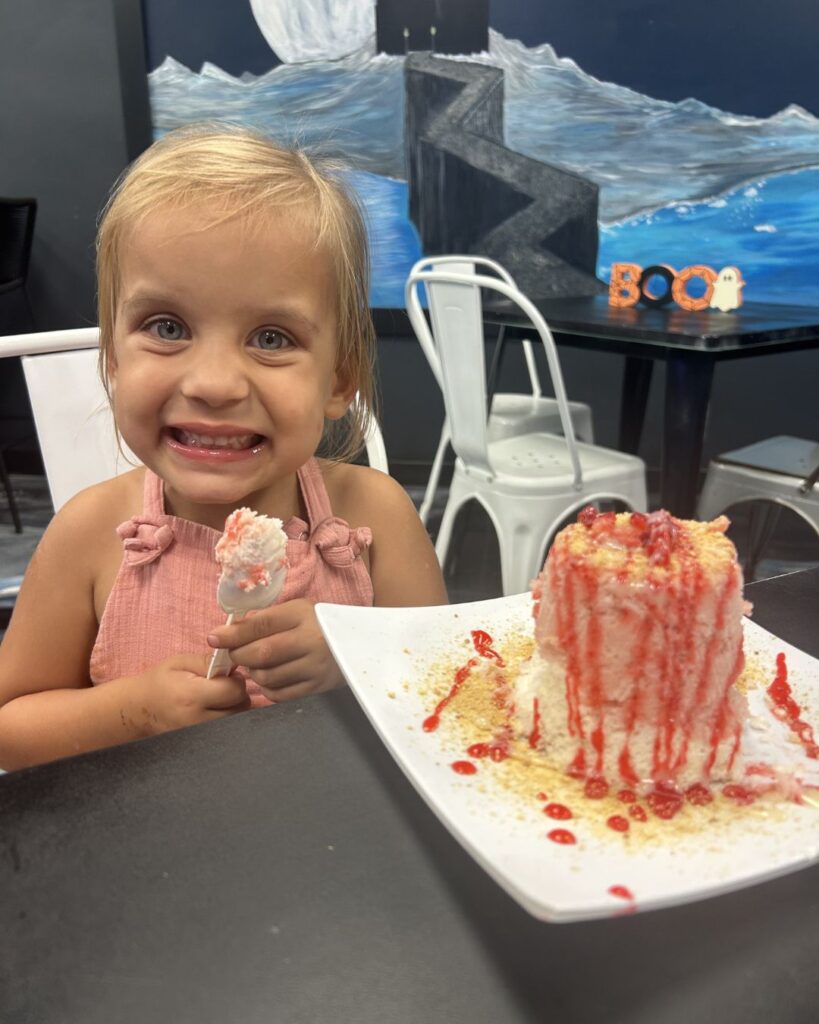 Enjoying snow cream at Vampire Penguin