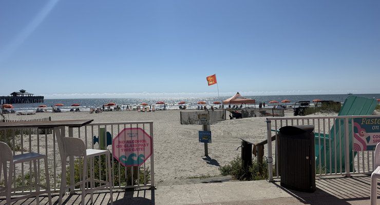 Beach access with sand and ocean view steps from Pinky's on the Beach in Folly Beach