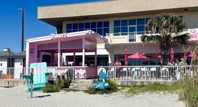 Pink oceanfront Pinky's on the Beach restaurant at Tides Folly Beach in Folly Beach, SC