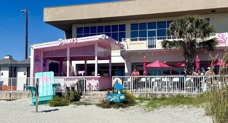Pink oceanfront Pinky's on the Beach restaurant at Tides Folly Beach in Folly Beach, SC